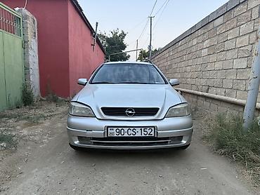 opel təkərləri: Opel Astra G (universał) – gümüşü rəng Texniki və komplektasiya: - — 2