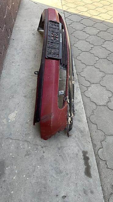 Задний бампер в сборе для легкового автомобиля. - Цвет: бордовый с