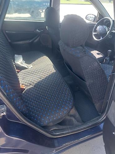 mini jack: Ford Focus: 2003 г., 1.6 л, Механика, Бензин, Универсал — 7