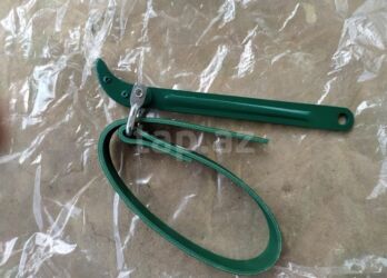 Döşəmə: Başlıq: Avto yağ filtri açan Təsvir: Universal qayışlı yağ filtri