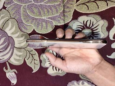 touch id: Смартфон с безрамочным экраном и вырезом под фронтальную — 4