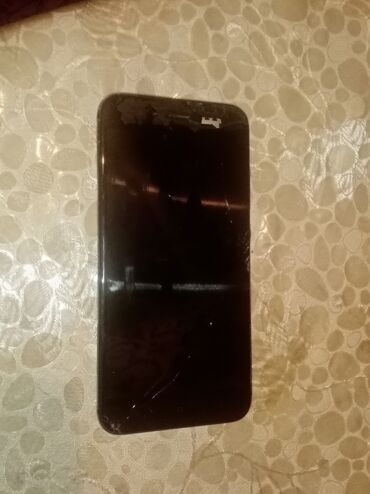 samsung s edge бу: Smartfon – qara rəngli, toxunmatik ekranlı model. Ön tərəfdə sensor