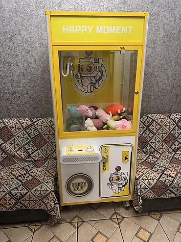 Срочно срочно продаётся Аппарат с игрушечным краном (кло-машина)