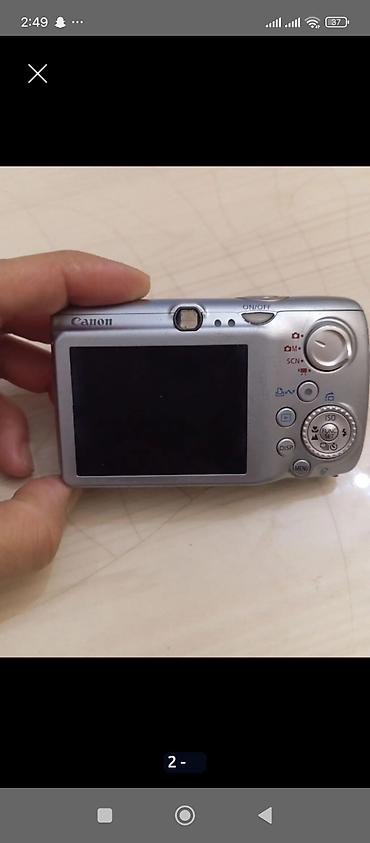 canon powershot sx20 is: Canon Digital IXUS 970 IS (AiAF) kompakt fotoaparat - Gümüşü korpus — 1