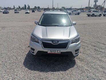 бишкек мото: Серебристый кроссовер Subaru Forester с элегантным дизайном
