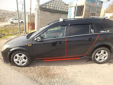şevralit avtomobil: Opel Astra: 1.3 l | 2006 il Universal — 7