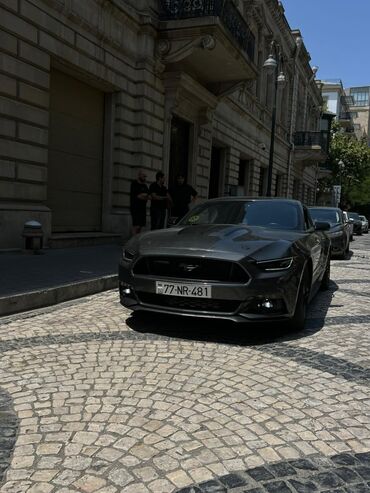 Ford: Model: Ford Mustang GT, kupe, 2 qapı Rəng: Tünd boz (metallic) Nömrə — 2