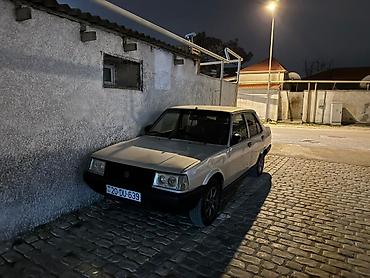 luaz satilir: Tofaş Şahin sedan - Kuzov: 4 qapılı sedan, gümüşü rəng - Nömrə — 1