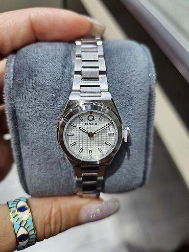 irsad saat: Timex Q seriyasından zərif qadın qol saatı - Korpus və qolbaq — 1