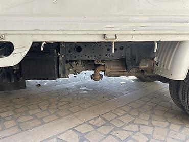 4 vd: Компактный бортовой малотоннажный грузовик Nissan (правый руль) — 9