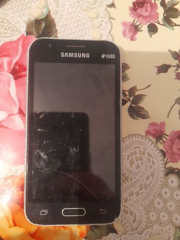 pulsuz telefon: Samsung Galaxy J1, 4 GB, rəng - Qara, Sensor