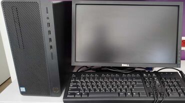 Masaüstü kompüterlər və iş stansiyaları: HP kompüteri, Dell monitoru və klaviaturası. Bu dəst evdə və ya ofisdə