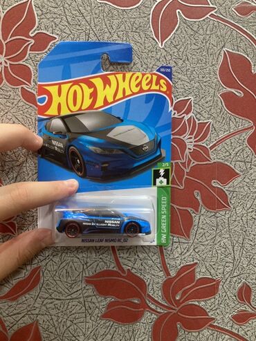 Avtomobil modelləri: Məhsul: Hot Wheels die-cast maşınları – EV mövzusu Dəst tərkibi: - — 7