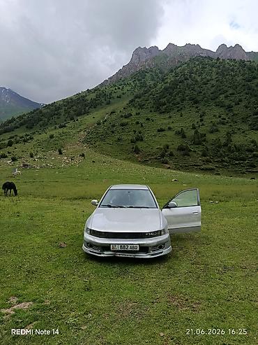 mazda 121 1994: Mitsubishi galant, серебристый цвет, номерной знак 07 882 ABQ — 1
