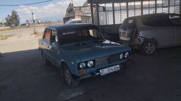 дом на колесах авто: Автомобиль ВАЗ-2106 синего цвета с характерным дизайном. Модель