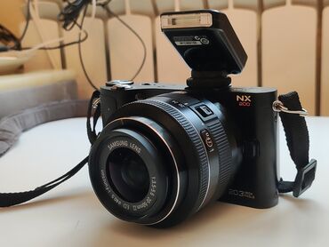 fotoaparat kirayesi: Samsung NX200 fotoaparat və obyektiv idealdır cızıq zad yoxdur şəkil