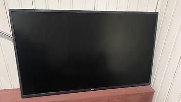 Телевизор LG, диагональ примерно 40–43". Плоская панель с тонкими