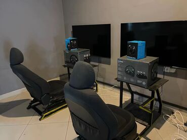 Video oyunlar üçün aksesuarlar: Logitech G923 yarış simulyatoru dəsti. Dəstə iki ədəd oturacaq, iki