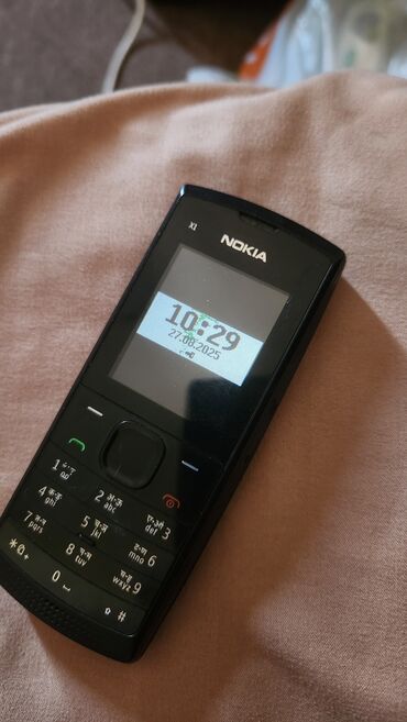 старые кнопочные телефоны: Nokia Xl, цвет - Черный