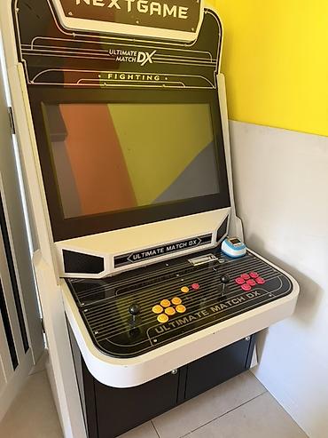 oyun rullari: Ultimate Match DX arkada oyunu kabineti - Korpus: hündür “sit‑down” — 3