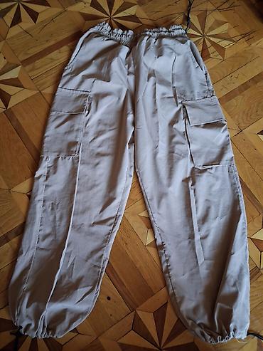 Bej rəngli cargo şalvar - Model: cargo/jogger üslubu - Rəng: açıq bej