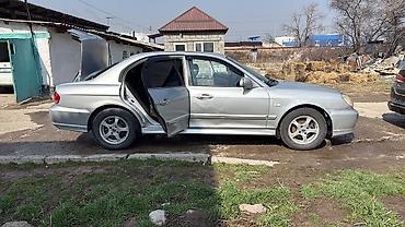 Другие автомобили: Седан серебристого цвета. Основные особенности: - Кузов: 4-дверный — 10