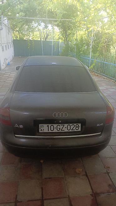 Audi A6: 2.4 l | Sedan