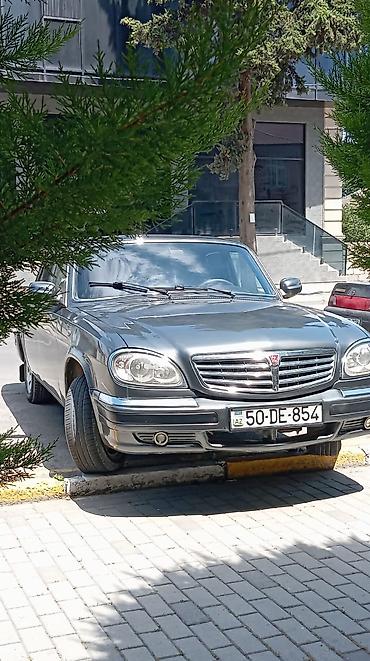 volga 2110: GAZ Volga 31105 sedan - Kuzov: 4 qapılı sedan, tünd boz rəng, xrom ön — 10