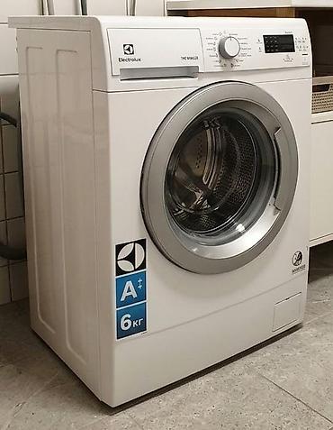 Electrolux önyükləməli paltaryuyan maşın - Tutum: 6 kq - Enerji