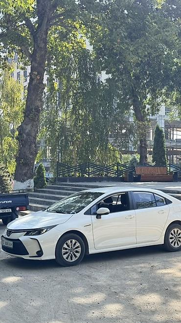 машина гибрид марки: Toyota Corolla: 2019 г., 1.8 л, Вариатор, Гибрид, Седан — 3
