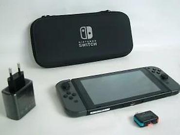 Nintendo Switch: Uz konzolu dolazi: Tablet (konzola) Joy-Con džojstici Punjač — 15