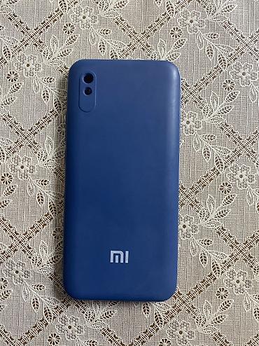 pixel 9a: Xiaomi Redmi (mavi rəng) - Ekran: təxminən 6” tam ekran, ön kamera — 3