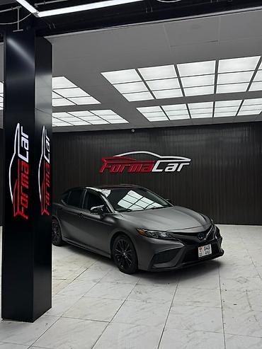 byd e2 2024: Toyota Camry: 2022 г., 2.5 л, Автомат, Гибрид, Седан — 4