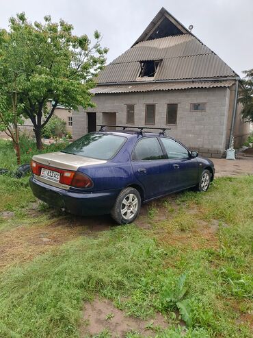 mazda 2000: Mazda 323: 1996 г., 1.5 л, Механика, Бензин, Седан