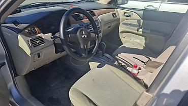 duman fara: Mitsubishi Lancer: 1.6 l | 2006 il 466000 km Sedan — 10