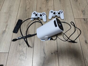 телевизор описание: Продаю проектор с играми, более тысячи игр, на базе андроида, можно