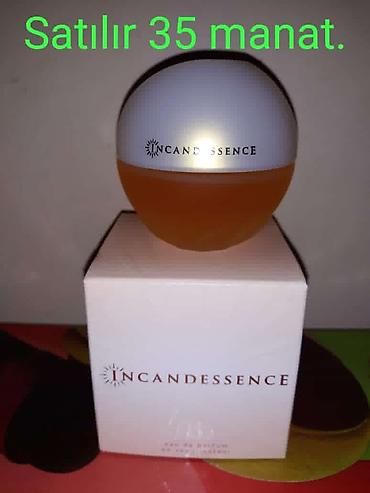 Ətriyyat: Oriflame brendinə aid "Dancing Lady Hypnotic Night" ətri. Bu ətir 50 — 53