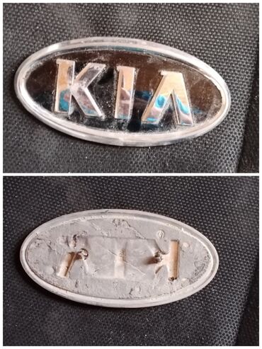 Bıçaqlar: KIA loqosu – oval formalı, xrom parıltılı emblem. - Ön tərəf: “KIA”