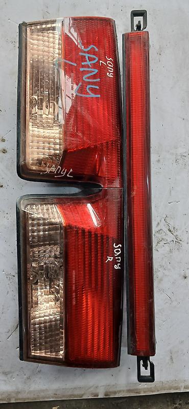 2001: Задние фонари для Nissan Sunny, год 2001. Комплект: - левая и правая — 2