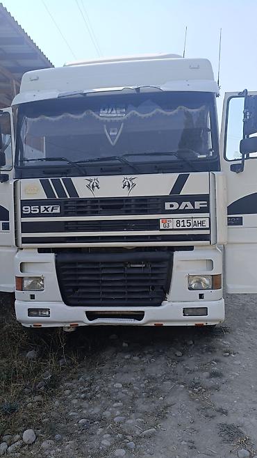 мото зонтик: Тягач, DAF, 2001 г., Тентованный — 1