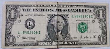 Əskinaslar: One dollar (1 dollar) 2001 seriyalı 12ci buraxılış solda(d1) sağda isə