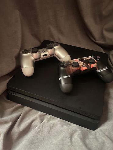 ps4 dualshock: PlayStation 4 Slim oyun konsolu paketi - Model: Sony PlayStation 4 — 2