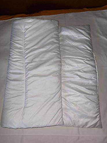 dečije posteljine pepco: Dečiji jorgančić u dobrom stanju, beli, dimenzije 113 cm x 80 cm — 1