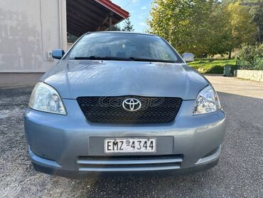 Transport: Toyota Corolla: 1.4 l | 2002 year Hatchback