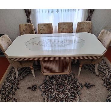 Masa desdi satılır 750.azn.Masa acilmitr.2/1 olcsunde.6 stulldur.Baha