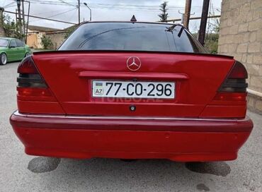 Mercedes-Benz: Mercedes-Benz C‑Class (W202) sedan, qırmızı rəng. - Kuzov: 4 qapılı — 3