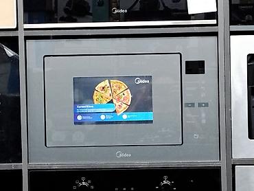 Встраиваемая микроволновая печь Midea XpressWave в сером цвете