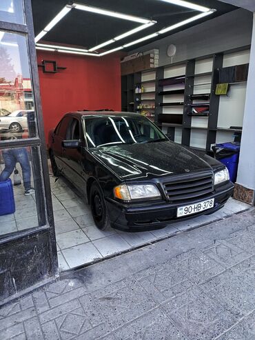 mercedes şəkilləri: Mercedes-Benz C 180: 2 l | 1994 il Sedan