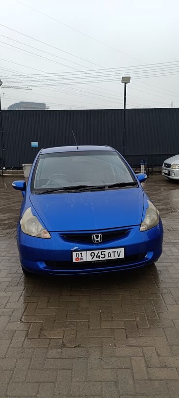 рейка на хонда фит: Автомобиль Honda Fit синего цвета, представленный в кузове хэтчбек