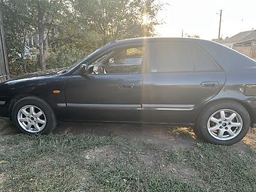 dodge caravan: Mazda 626: 1998 г., 1.8 л, Механика, Бензин, Седан — 5